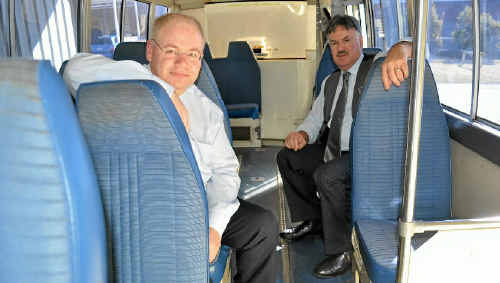 Warwick Credit Union CEO Lewis von Stieglitz and Akooramak CEO Darryl Chapman sit in the old bus. Warwick Credit Union CEO Lewis von Stieglitz and Akooramak CEO Darryl Chapman sit in the old bus.